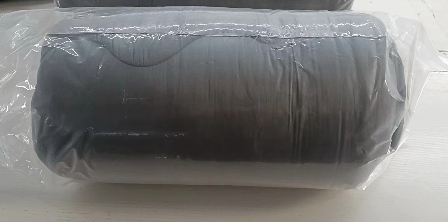 Rolled and sealed comforter